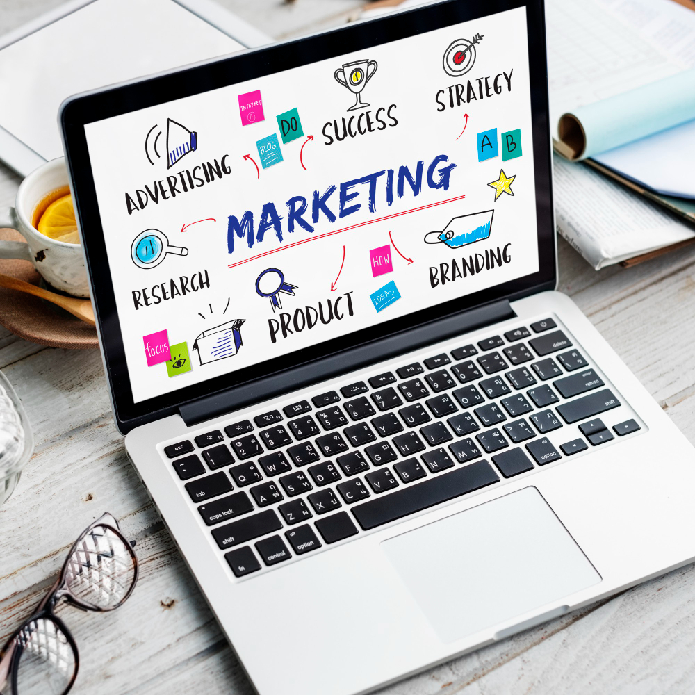 An open laptop displaying various marketing services such as branding, SEO, social media, and content creation, symbolizing the diverse expertise offered by our marketing agency.
